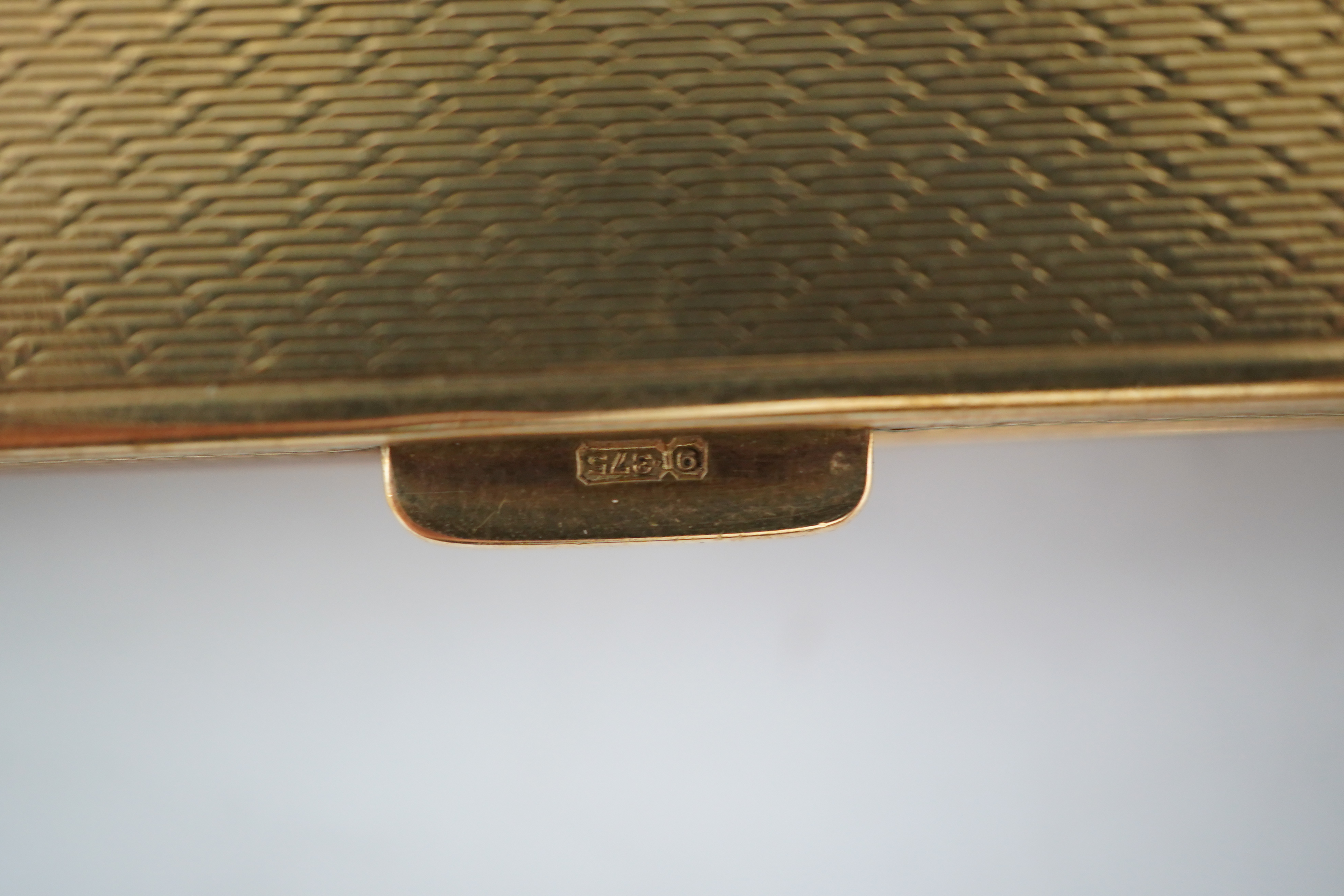 A 9ct gold cigarette case, circa 1930